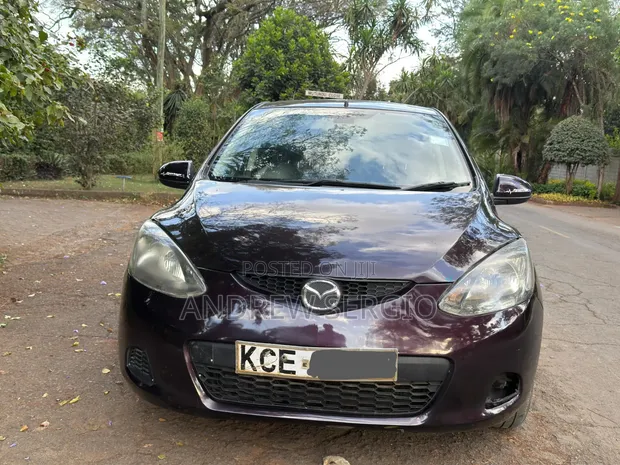 Mazda Demio 2011 Burgundy - 1