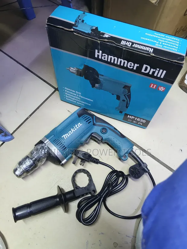 Makita Electric Corded Drill - 1