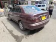 Nissan FB14 1999 Rangi ya Maroon - 1