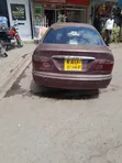 Nissan FB14 1999 Rangi ya Maroon - 3