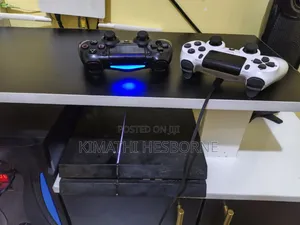 PS4 Standard Version - Chipped with 9 Games & 2 Controllers