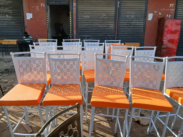 High Powered Coated Chairs with Orange Seats - 1