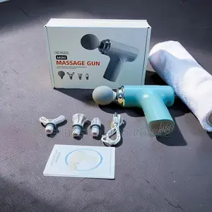 Brand New Massage Gun with 4 Interchangeable Heads