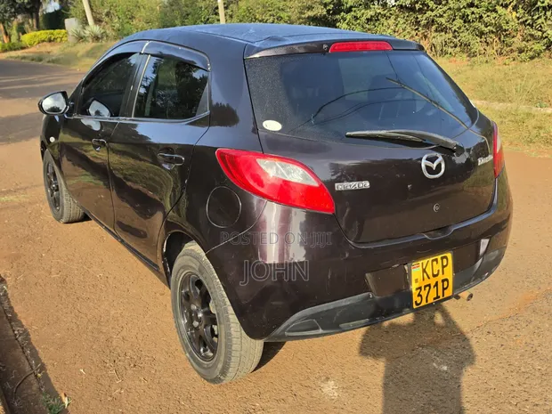 Mazda Demio 2011 Maroon - 1