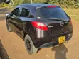 Mazda Demio 2011 Maroon - 1