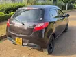 Mazda Demio 2011 Maroon - 2