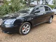 Toyota Avensis Liftback 2004 Nyeusi - 2
