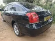 Toyota Avensis Liftback 2004 Nyeusi - 4