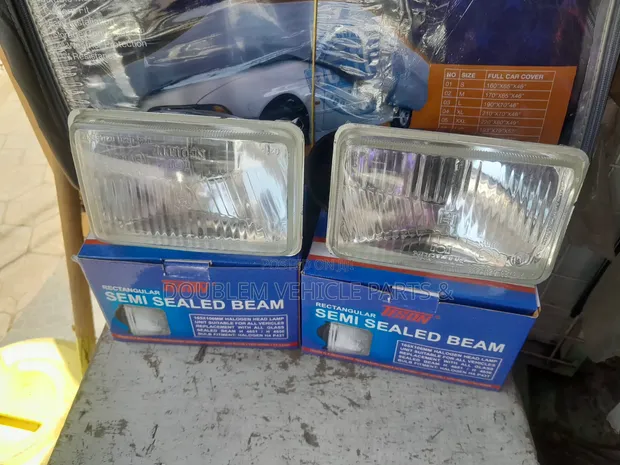 Isuzu NKR/NPR, Mitsubishi FH215 Canter Headlights - 1