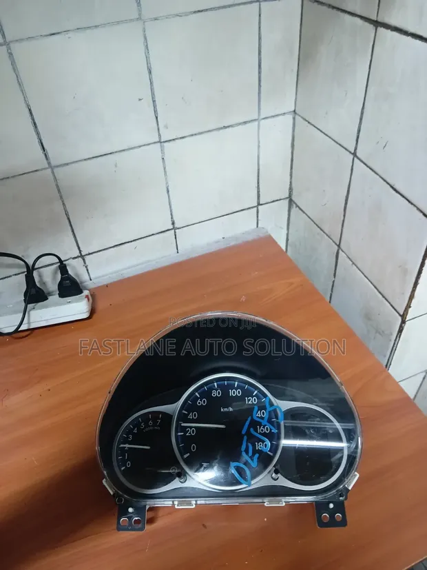 Dashboard Clock Mazda Demio - 1