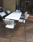 6-Seater White Foldable Plastic Table and Chairs Set - 1