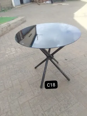 Round Black Glass Top Dining Table