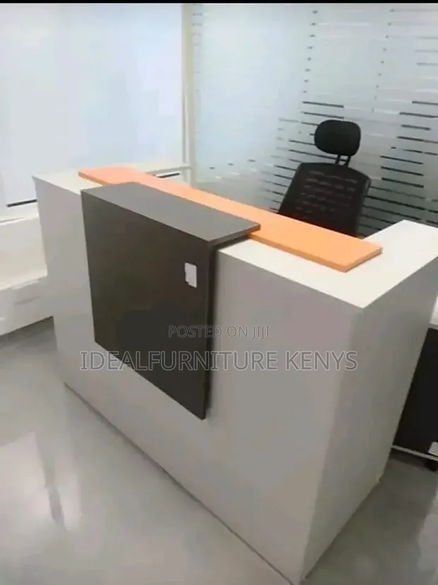 Modern White Reception Desk with Orange & Dark Brown Accents - 1
