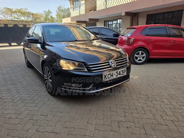 Volkswagen Passat 1.4 TDI BlueMotion Sedan 2012 Nyeusi - 1