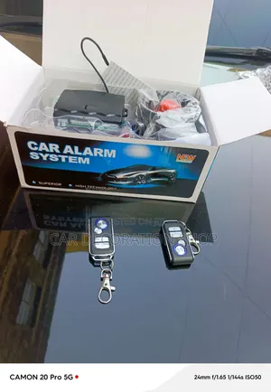 Car Alarm System with Metal Trimmed Keychain
