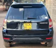 Subaru Forester 2010 Nyeusi - 4