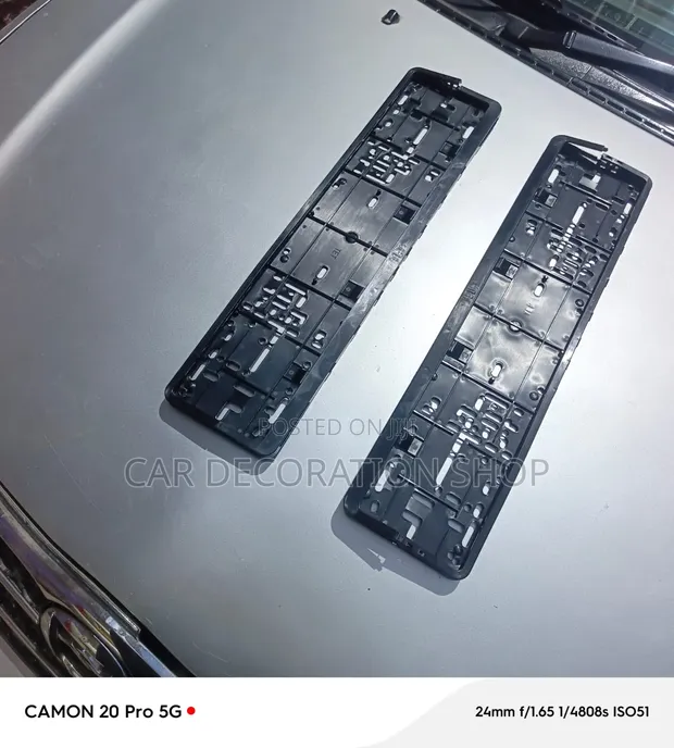 Secure Black Plastic Oblong License Plate Holder - 1