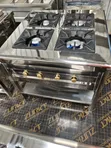 Four Burner Stainless Steel Commercial Cooker with Cast Iron Grill - 1