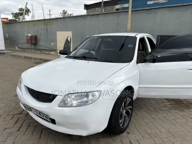Mazda Familia 2005 White - 1