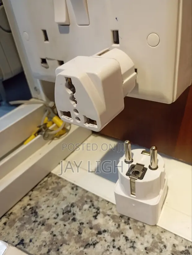 Universal Travel Plug Adapter Converter (US, UK, AU, EU, Korea, Africa) - 1