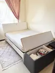 Used 5x6 Wooden Bed with Ottoman and Mattress - 1