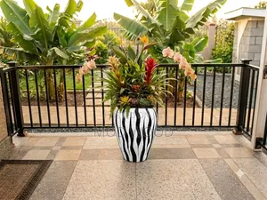 Bold Zebra Stripe Floor Flower Pot with Faux Tropical Foliage