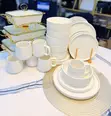 24-Piece Textured Ceramic Dinner Set + Gold Food Warmer - 1