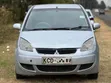 Mitsubishi Colt 2004 Nyeupe - 1