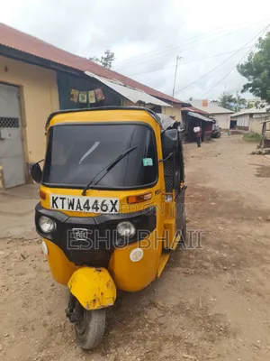 Bajaj 2010 Yellow Three-Wheeler