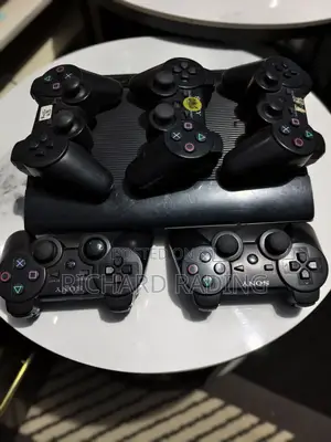 PlayStation 3 1TB with 27 Games & 5 Controllers