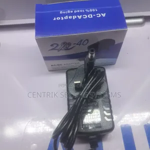 Universal 12V 2A AC/DC Power Supply Adapter (UK Plug)