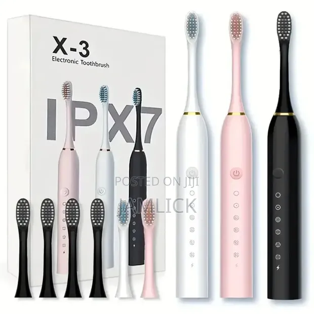 Sonic Electric Toothbrush with 4 Replaceable Heads - 1