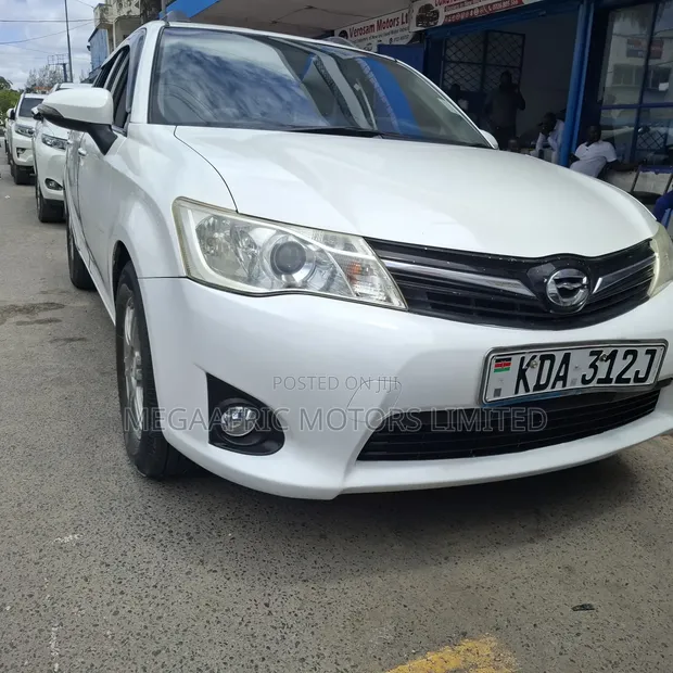 Toyota Corolla Fielder 1.5 Petrol AWD 2014 White - 1