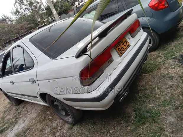 Nissan Sunny 2006 White - 1