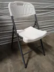 Heavy-Duty White Plastic Folding Chair - 1