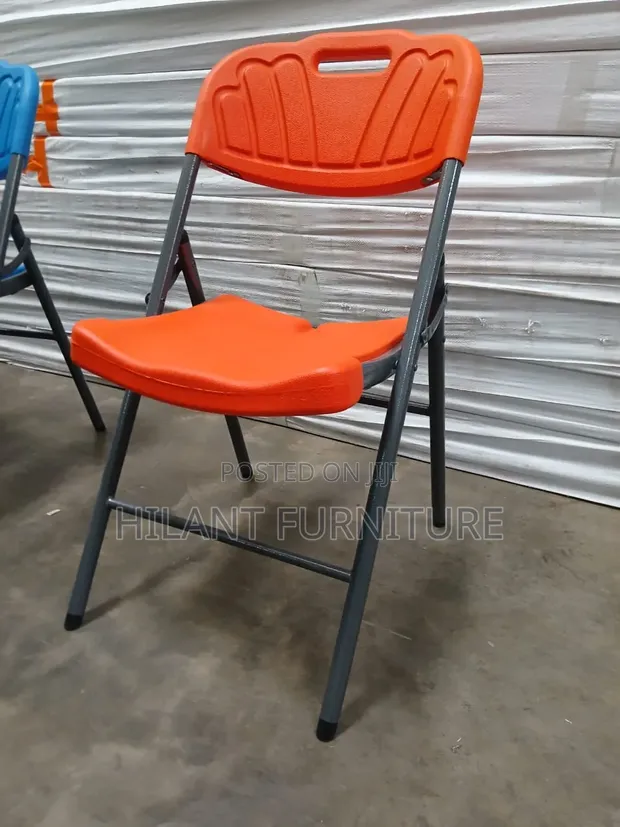 Heavy-Duty Orange Plastic Folding Chair - 1