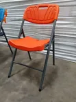 Heavy-Duty Orange Plastic Folding Chair - 1
