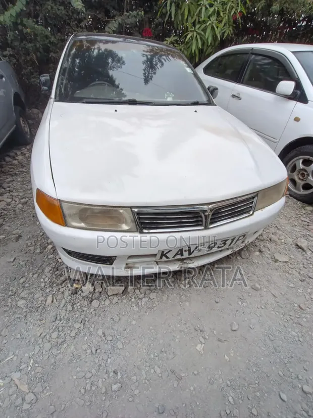 Mitsubishi Lancer 1999 White - 1