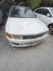 Mitsubishi Lancer 1999 White - 1