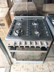 Haier 60x60cm 4-Burner Gas Cooker with Wok Burner & Turbo Fan - 1