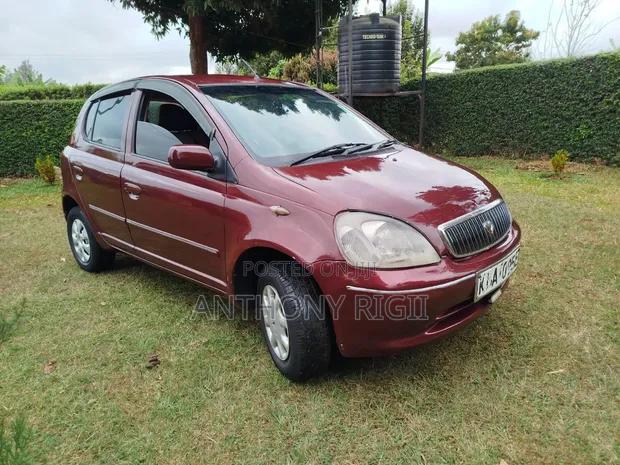 Toyota Vitz 2001 Burgundy - 1