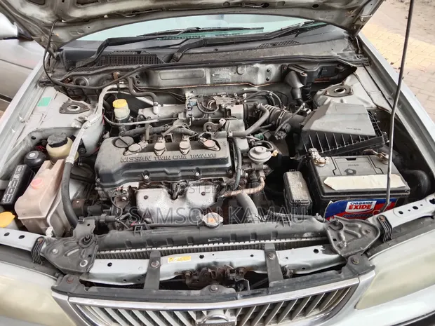 Nissan Sunny 2001 Silver - 1