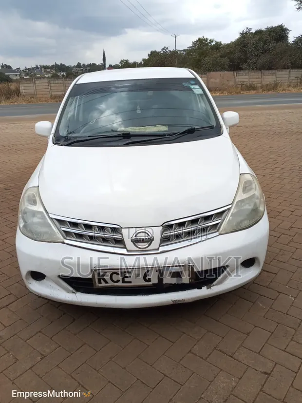 Nissan Tiida 2008 White - 1