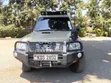 Nissan Patrol 2016 Beige Tour Van - 1
