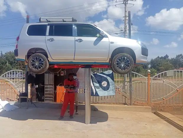 New Heavy Duty Commercial Single Post Lift - 1