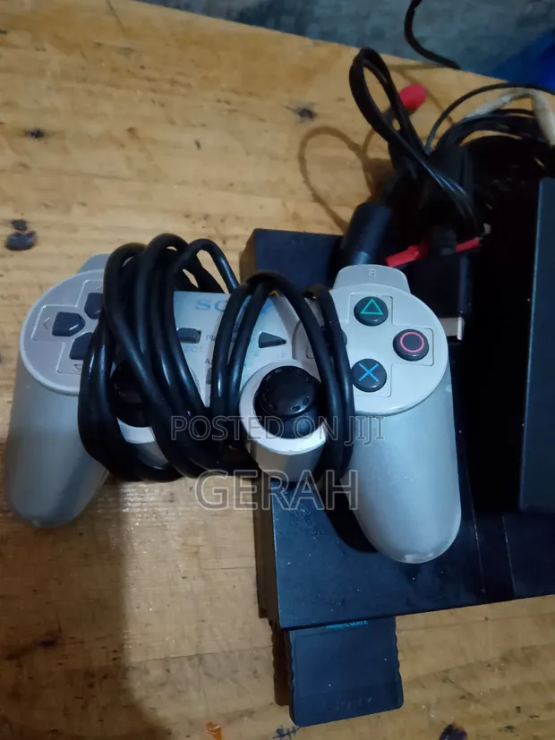PS2 Slim Chipped Console with 2 Controllers & 8 Games - 1