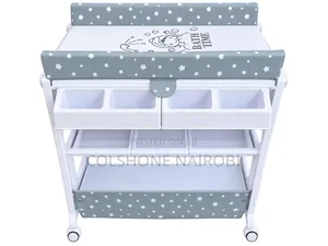 GE Baby Changing Table with Storage Shelves