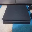 PlayStation 4 Pro - Chipped, 2 Controllers, 3 Games - 5