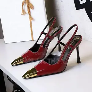 Boxed Two-Tone Patent Leather Slingback Stilettos