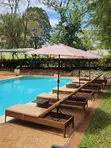 Rattan Sun Loungers + Outdoor Umbrella - 1